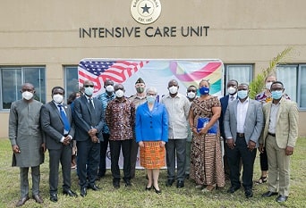 Ambassador Sullivan flanked by other officials in a group photo
